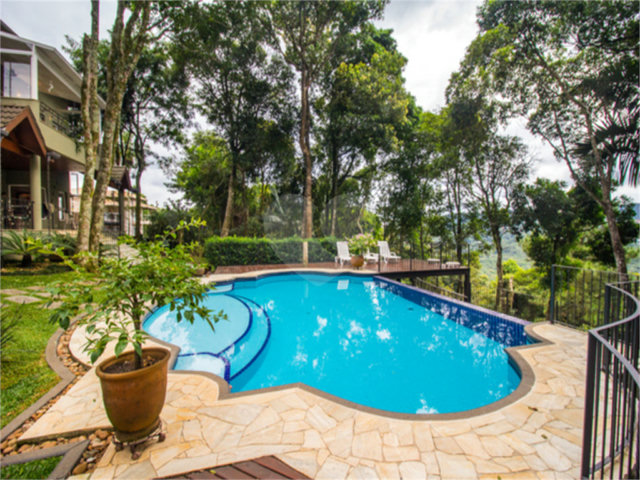 Casa à venda com 4 suítes no condomínio Alpes da Cantareira, Mairiporã - SP