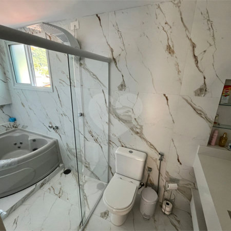 Casa à venda com 2 suítes no condomínio Recanto da Lagoinha, Ubatuba - SP