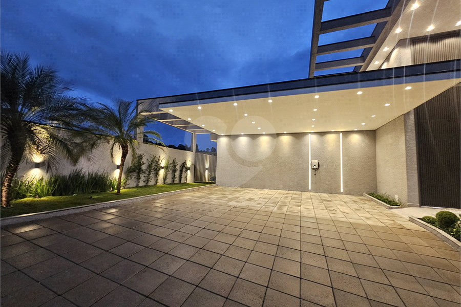 Casa à venda com 4 suítes no condomínio Villas do Jaguari, Santana de Parnaíba - SP