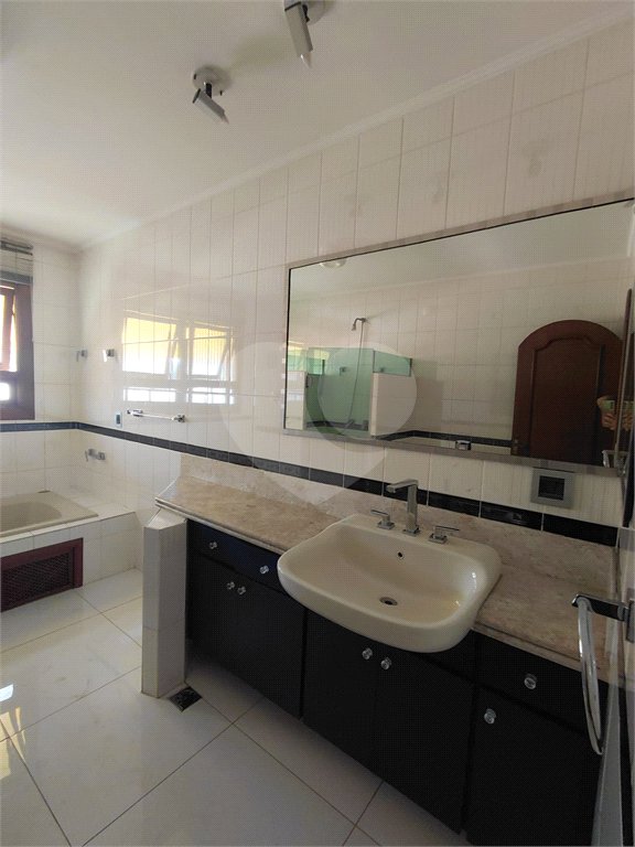 Casa à venda com 4 suítes no condomínio Ville Bourghese, São Paulo - SP