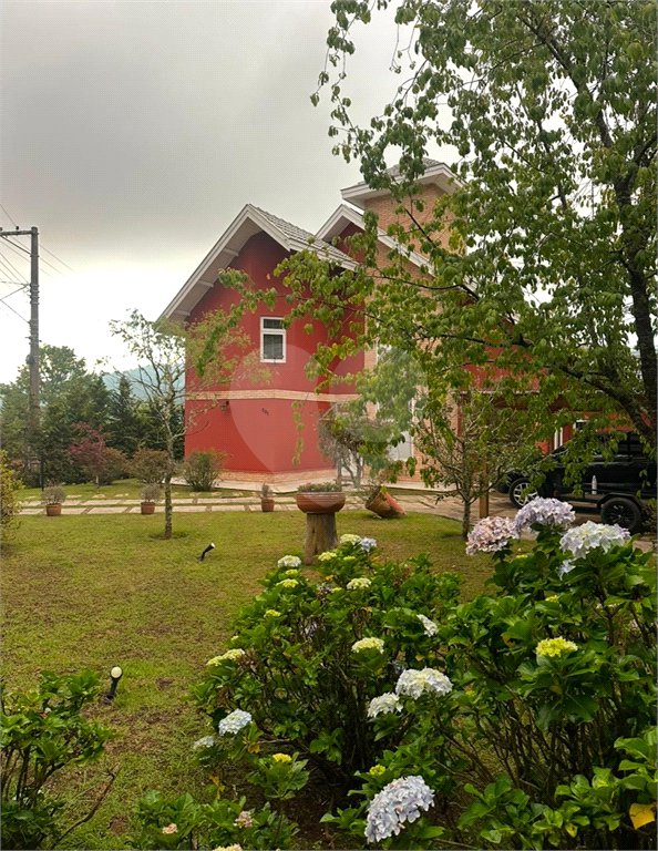 Casa à venda com 3 suítes no condomínio Vila Austríaca, Campos do Jordão - SP