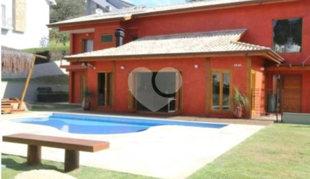 Casa à venda com 4 suítes no condomínio Suíça da Cantareira, Mairiporã - SP