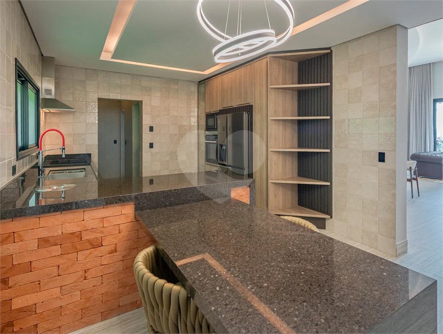 Casa à venda com 4 suítes no condomínio Vale da Santa Fé, Vinhedo - SP
