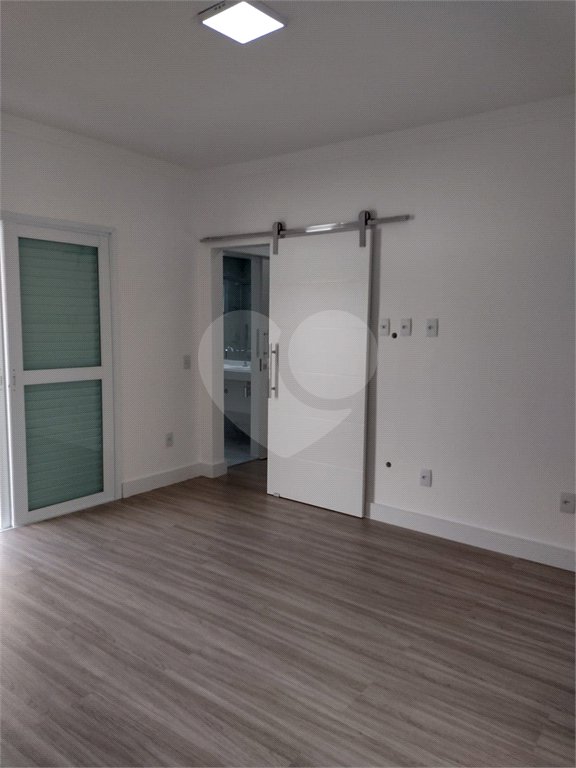 Casa à venda com 4 suítes no condomínio Estância Marambaia, Vinhedo - SP