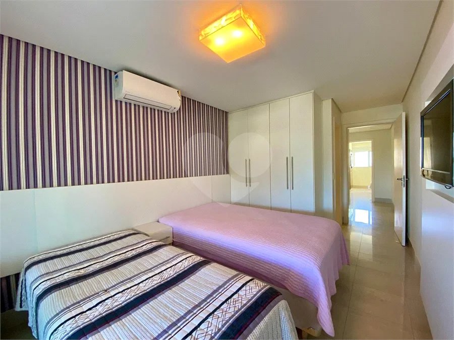 Apartamento à venda com 4 suítes em Riviera de São Lourenço, Bertioga, SP