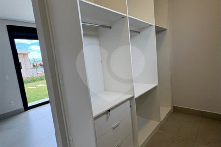 Casa à venda com 4 suítes no condomínio Portal dos Bandeirantes, Salto - SP