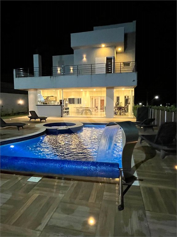 Casa à venda com 4 suítes no condomínio Figueira Garden, Atibaia - SP