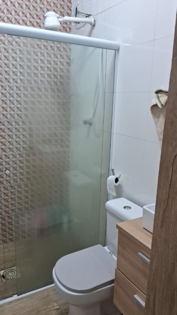 Sobrado com 3 dormitórios à venda, 150 m² por R$ 780.000,00 - Estuário - Santos/SP