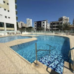 Apartamento com 2 dormitórios à venda, 89 m² por R$ 770.000,00 - Vila Guilhermina - Praia Grande/SP