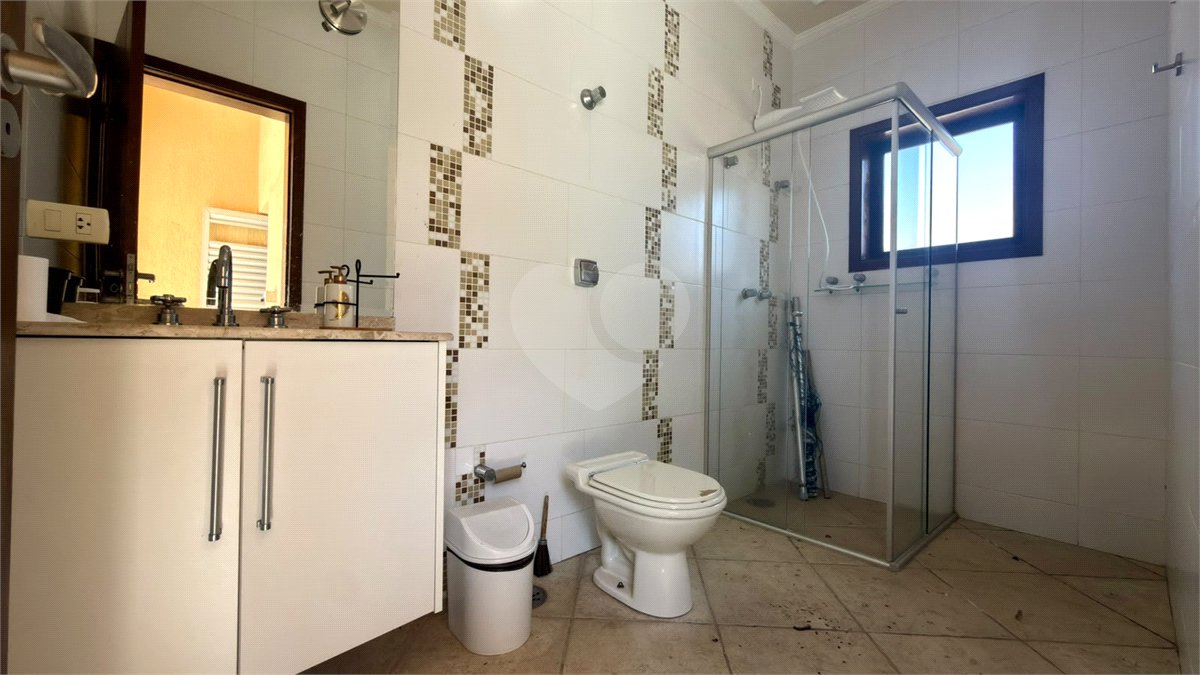 Casa à venda com 4 suítes no condomínio Parque Village Castelo, Itu - SP