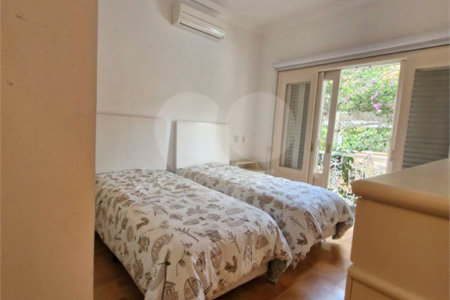 Casa à venda com 4 suítes no condomínio Estância Marambaia, Vinhedo - SP
