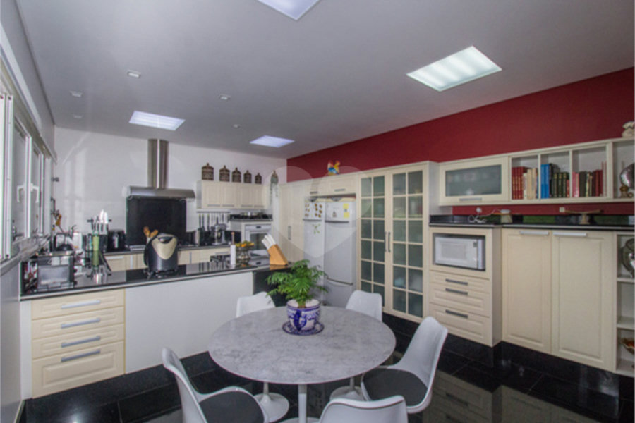 Casa à venda com 4 suítes no condomínio Alpes da Cantareira, Mairiporã - SP