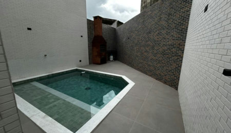 Casa com 3 dormitórios à venda, 100 m² por R$ 1.380.000,00 - Aparecida - Santos/SP