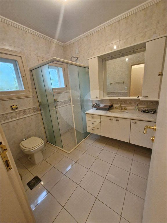 Casa à venda com 4 suítes no condomínio Estância Marambaia, Vinhedo - SP