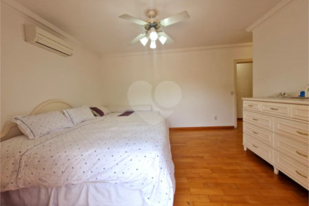 Casa à venda com 4 suítes no condomínio Estância Marambaia, Vinhedo - SP