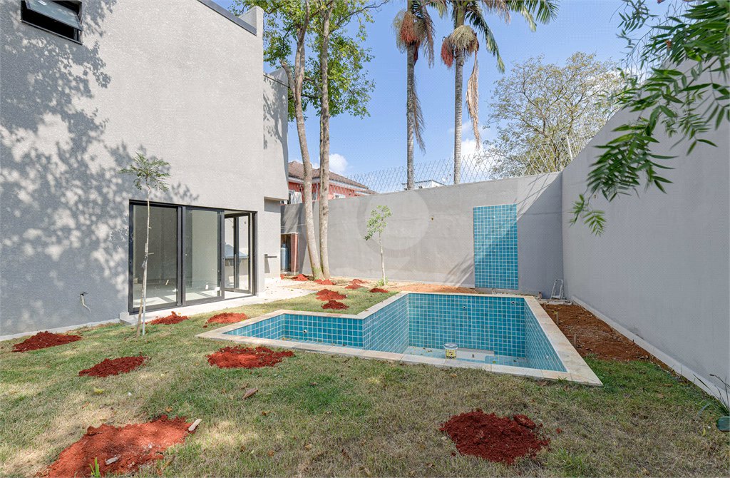 Casa à venda com 4 suítes no condomínio Reserva Robélia, São Paulo - SP