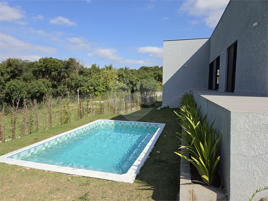 Casa à venda com 4 quartos, sendo 3 suítes, no condomínio Village Ipanema 2, Araçoiaba da Serra - SP