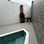Casa com 3 dormitórios à venda, 100 m² por R$ 1.380.000,00 - Aparecida - Santos/SP