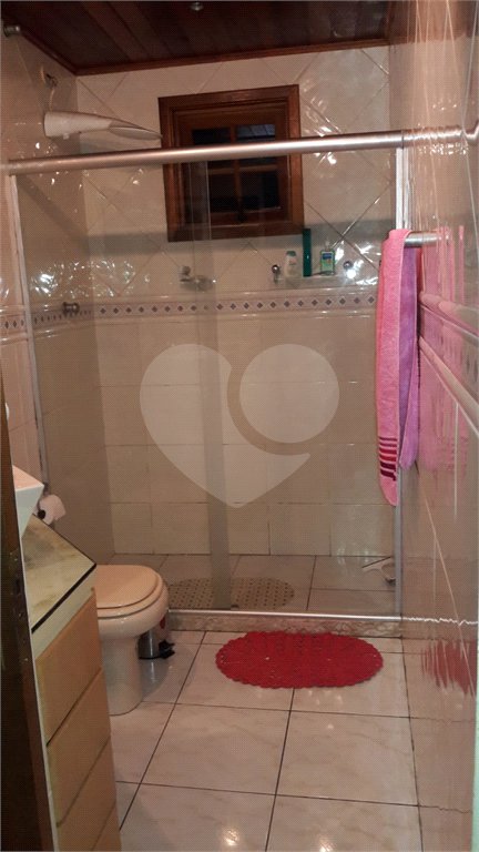 Casa à venda com 3 quartos, sendo 2 suítes, no condomínio Itatitara, Rio de Janeiro - RJ