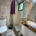 Apartamento com 2 dormitórios à venda, 64 m² por R$ 360.000,00 - Jardim Praiano - Guarujá/SP
