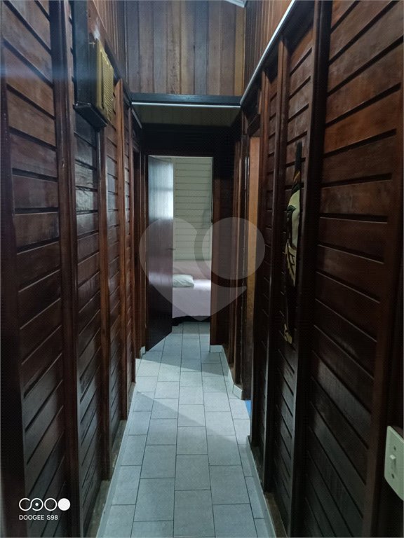 Casa à venda com 4 quartos, sendo 1 suíte,  no condomínio Morada da Praia, Bertioga - SP