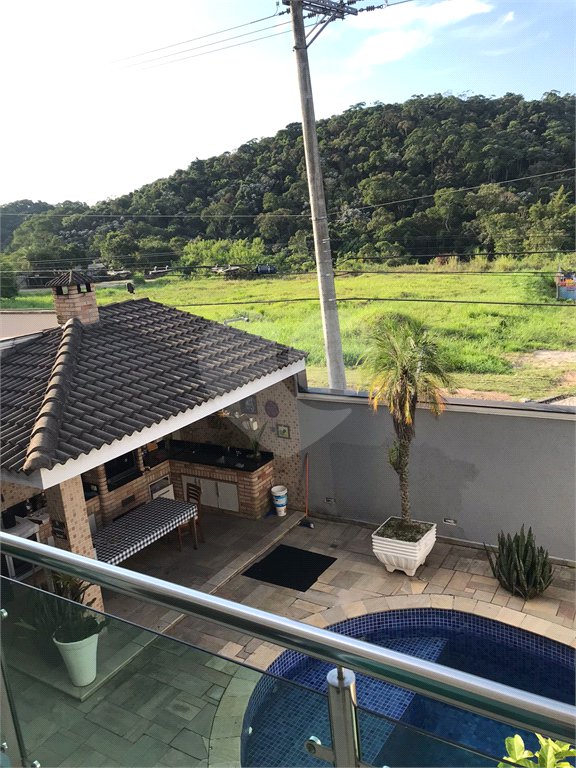 Casa à venda com 4 suítes no condomínio Aruã, Mogi das Cruzes - SP