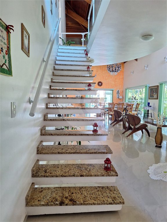 Casa à venda com 4 suítes no condomínio Bougainville, Peruíbe - SP