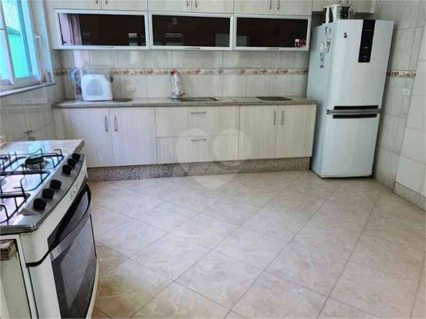 Casa à venda com 3 suítes no condomínio Quinta de Santo Antônio, São Paulo - SP