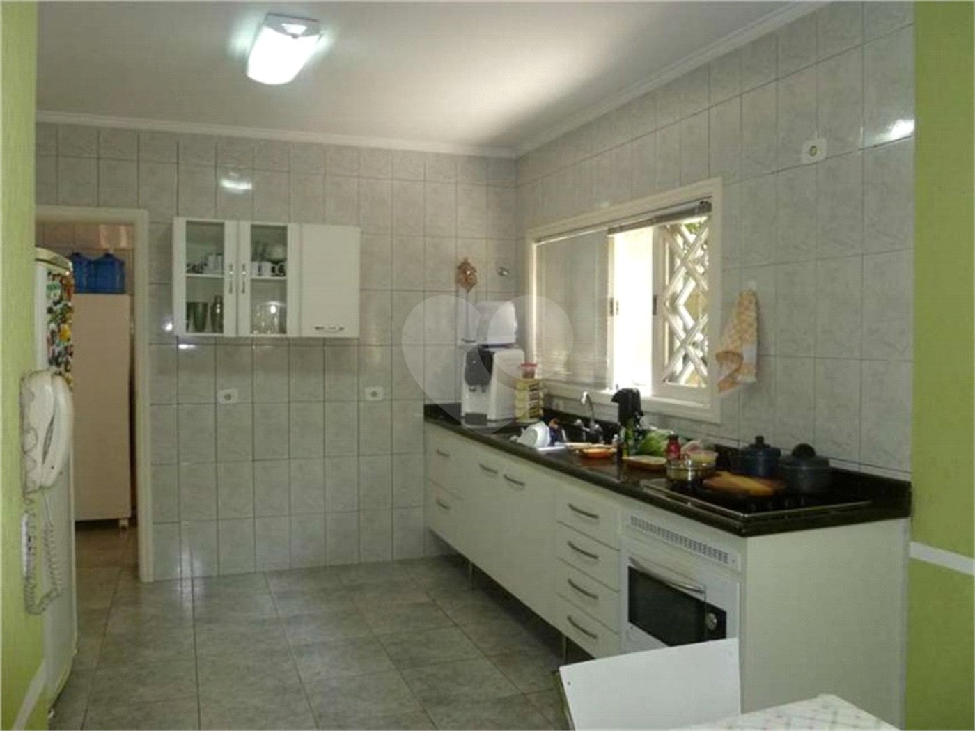 Casa à venda com 3 quartos, sendo 1 suíte, no condomínio Vivenda das Vinhas, Vinhedo - SP
