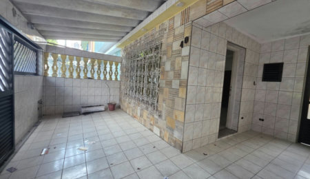 Sobrado com 3 dormitórios à venda, 129 m² por R$ 638.000,00 - Encruzilhada - Santos/SP