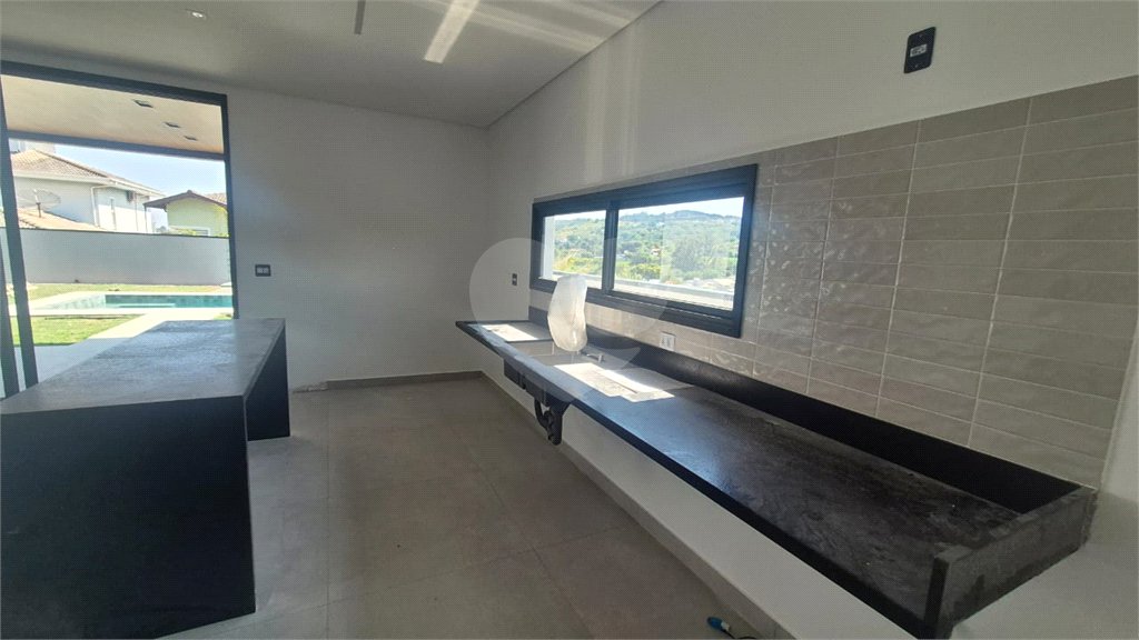 Casa à venda com 3 suítes no condomínio Recanto dos Paturis, Vinhedo - SP