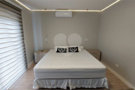 Casa à venda com 4 suítes no condomínio Figueira Garden, Atibaia - SP