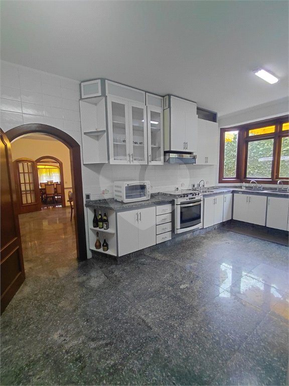 Casa à venda com 4 suítes no condomínio Ville Bourghese, São Paulo - SP