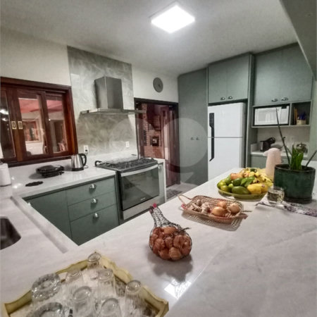Casa à venda com 3 suítes no condomínio Aruã, Mogi das Cruzes - SP