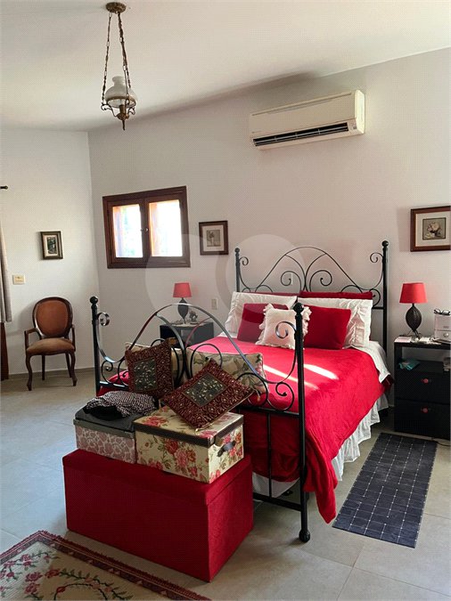 Casa à venda com 4 suítes no condomínio Residencial Vale das Laranjeiras, Indaiatuba - SP