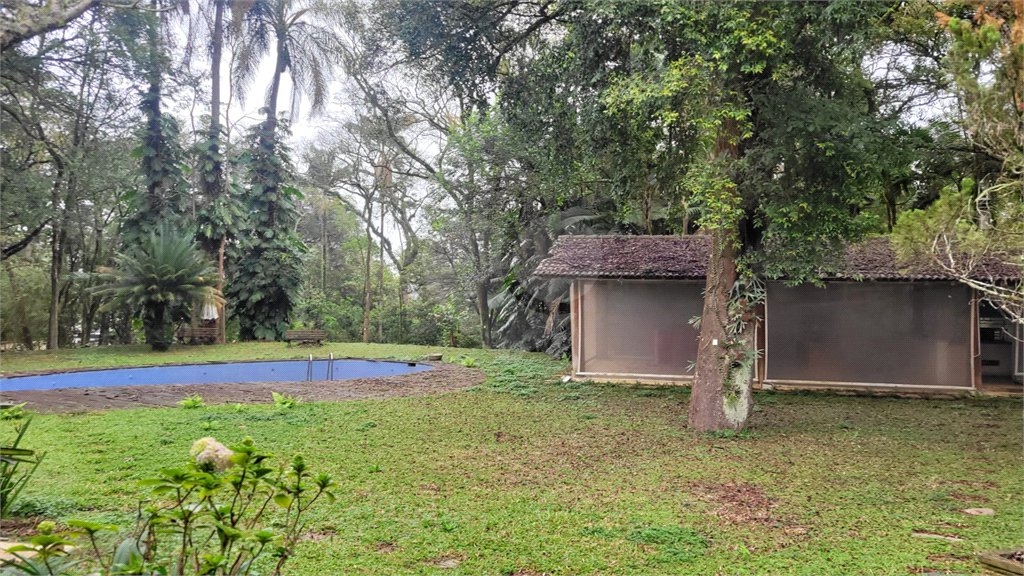 Casa à venda com 4 suítes no condomínio Chácara Flora, São Paulo - SP