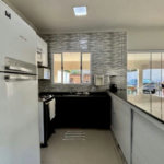 Sobrado à venda, 270 m² por R$ 1.010.000,00 - Balneário Praia do Pernambuco - Guarujá/SP