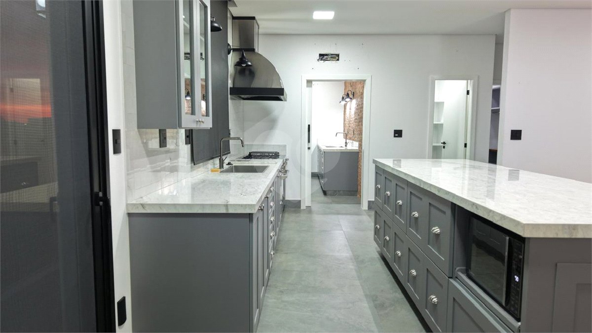 Casa à venda com 4 suítes no condomínio Alphaville Dom Pedro 3, Campinas - SP