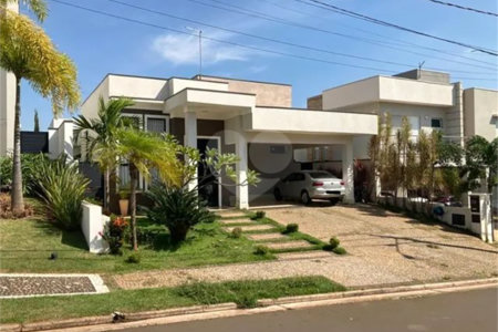 Casa à venda com 3 suítes no condomínio Terras do Cancioneiro, Paulínia - SP