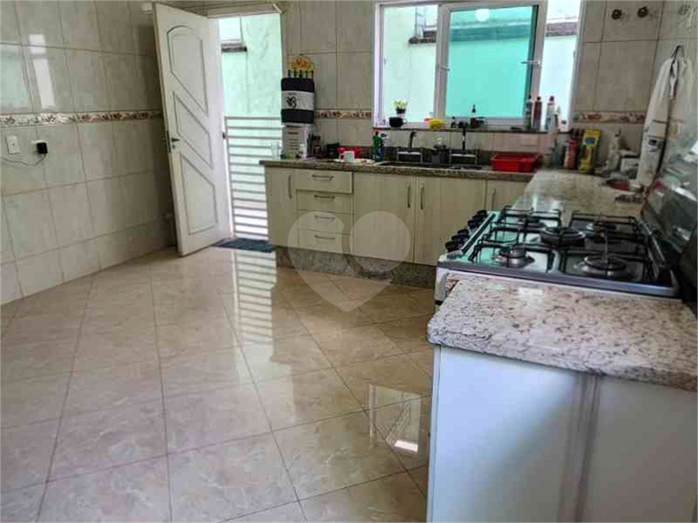 Casa à venda com 3 suítes no condomínio Quinta de Santo Antônio, São Paulo - SP