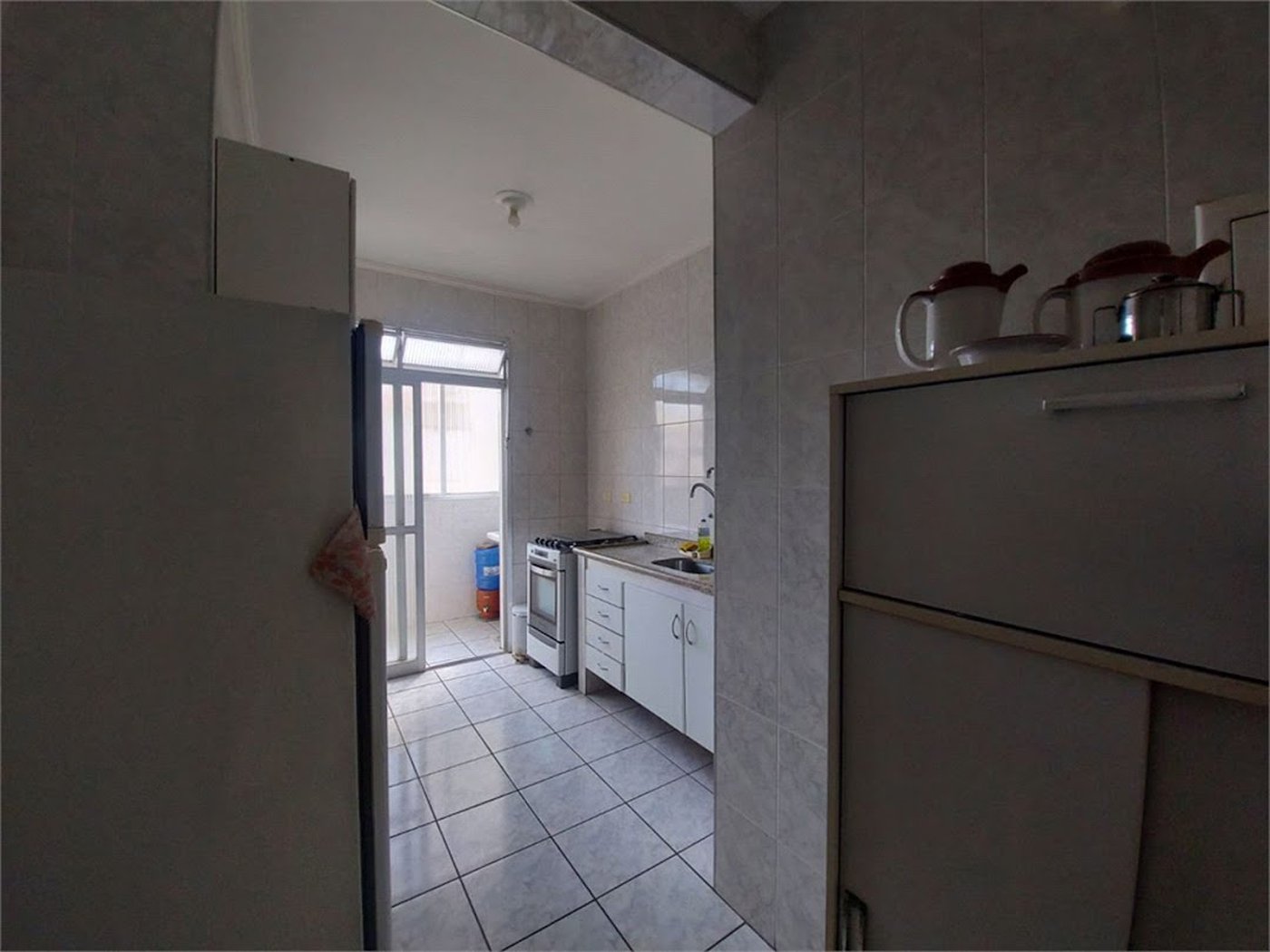 Apartamento com 3 dormitórios à venda, 87 m² por R$ 400.000,00 - Jardim Praiano - Guarujá/SP