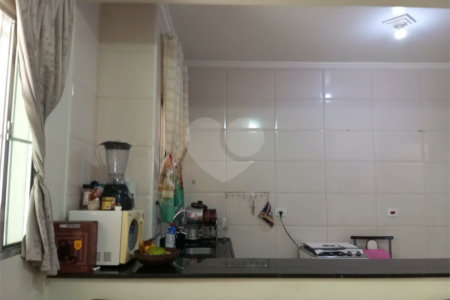 Terreno á venda com 2 casas na Vila Rosália, Guarulhos, SP.