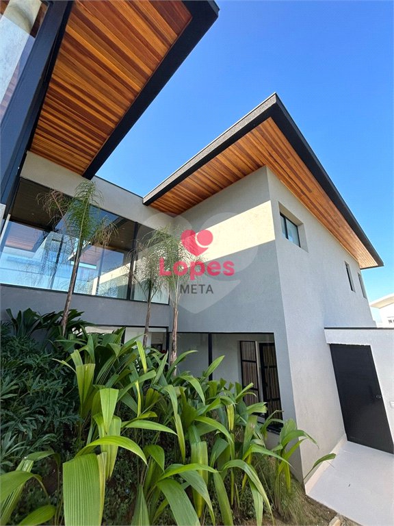 CASA LINDA NO CONDOMINIO RESERVA DO PARATEHY COM 4 DORMITORIOS, 4 SUÍTES, PISCINA, ELEVADOR, SJC