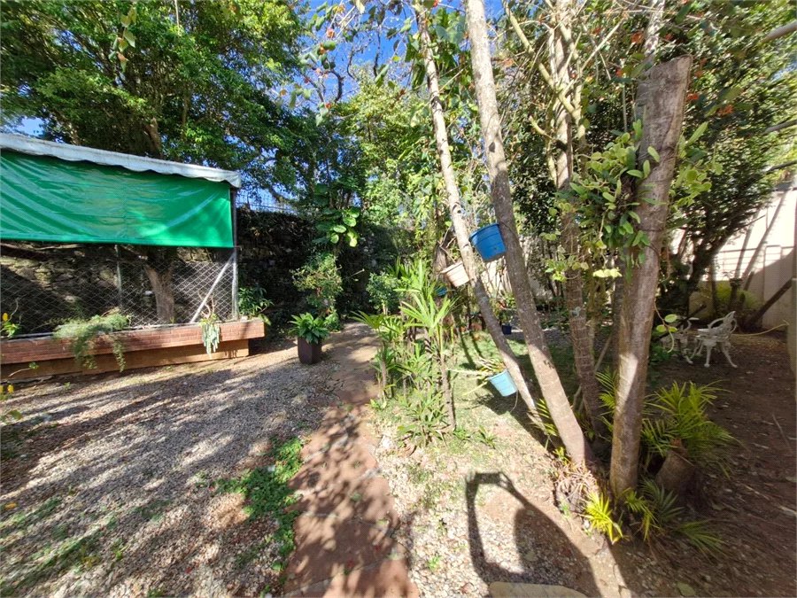 Casa à venda com 4 suítes no condomínio Villa Viana II, Cotia - SP