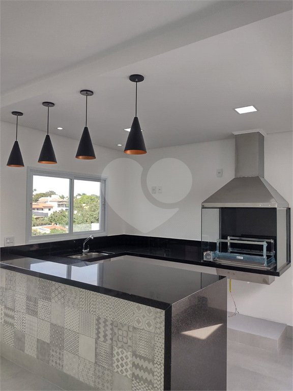 Casa à venda com 4 suítes no condomínio Estância Marambaia, Vinhedo - SP