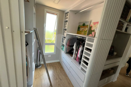 Casa à venda com 2 suítes no condomínio Recanto da Lagoinha, Ubatuba - SP