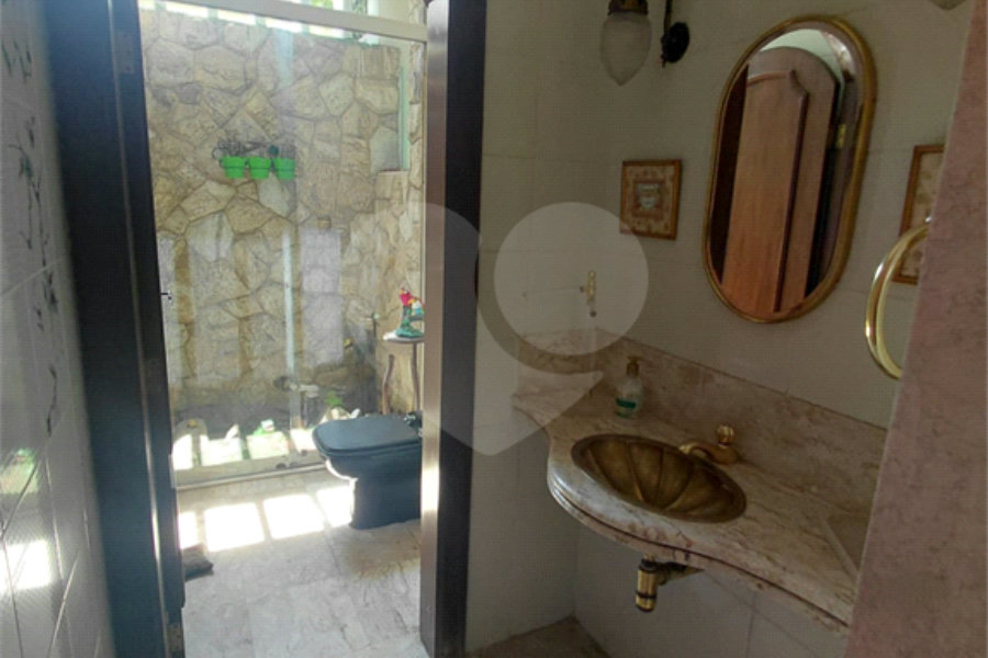 Casa à venda com 4 suítes no condomínio Ville Bourghese, São Paulo - SP