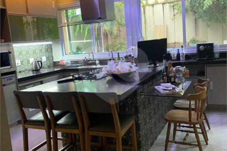 Casa à venda com 4 suítes no condomínio Granja Morumbi, São Paulo - SP