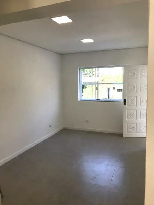 Casa com 3 dormitórios à venda, 116 m² por R$ 690.000,00 - Gonzaga - Santos/SP