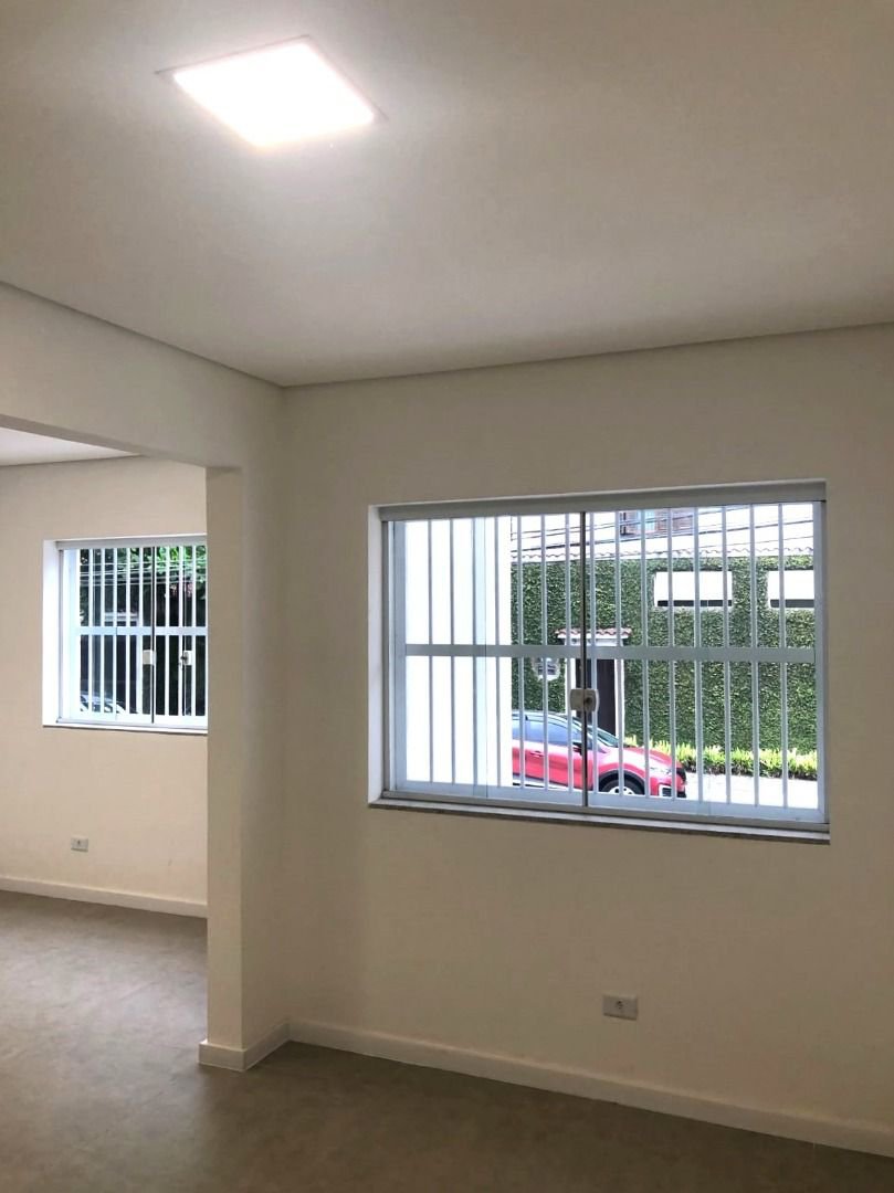 Casa com 3 dormitórios à venda, 116 m² por R$ 690.000,00 - Gonzaga - Santos/SP